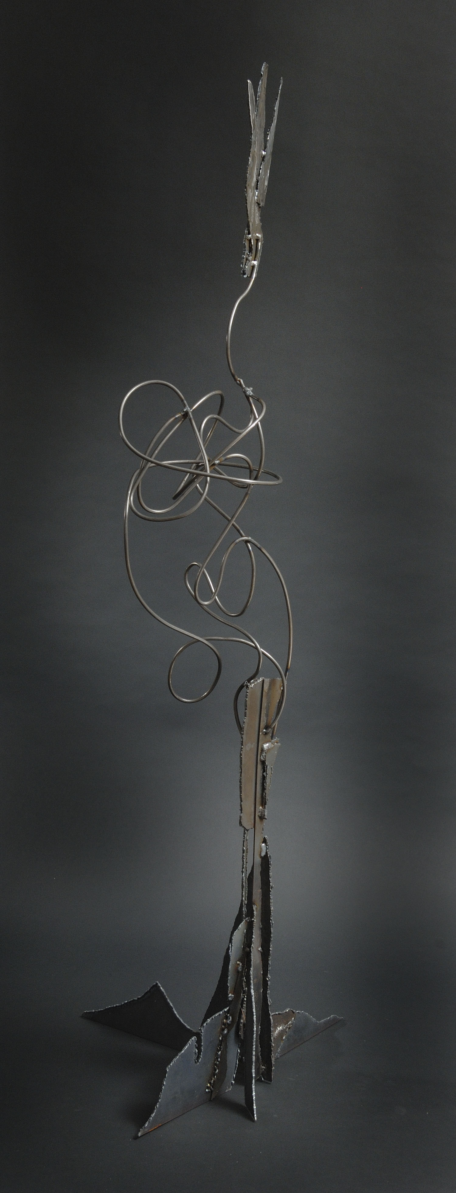 welded cut steel and steel rod make this strong and humorous cornstalk.