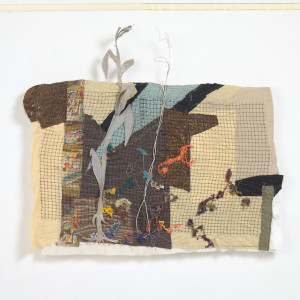 The Iowa flood of 2008 inspired this portrait of resiliance using mixed materials of fiber, wire and plastic mesh with hand and machine stitching.