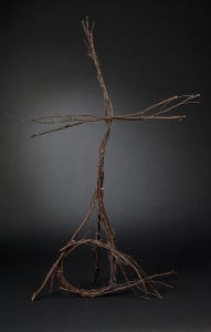 This is a 3-d cross made of twigs.